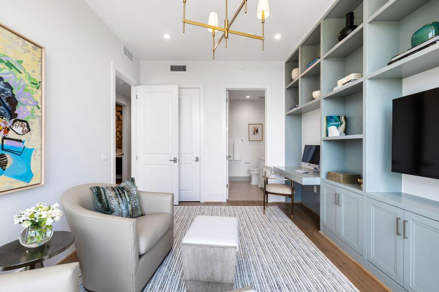 Alternate view of the secondary En-suite guest bedroom with the option for an upgrade built-in book shelves and cabinetry Alternate view of the secondary En-suite guest bedroom with the option for an upgrade built-in book shelves and cabinetry