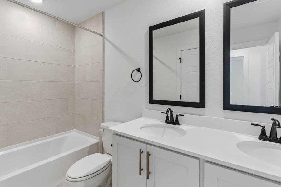 Furnished interior view inside a new home in Centero at Stone Oak, San Antonio (Image 14).