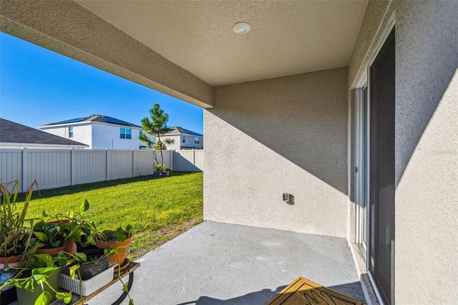 Exterior details and patio area of a home in River Park, Temple Terrace (Image 29).