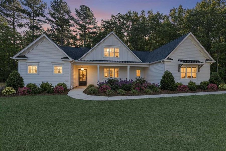 Front exterior of a new home in , Ball Ground, GA, highlighting curb appeal (Image 16).