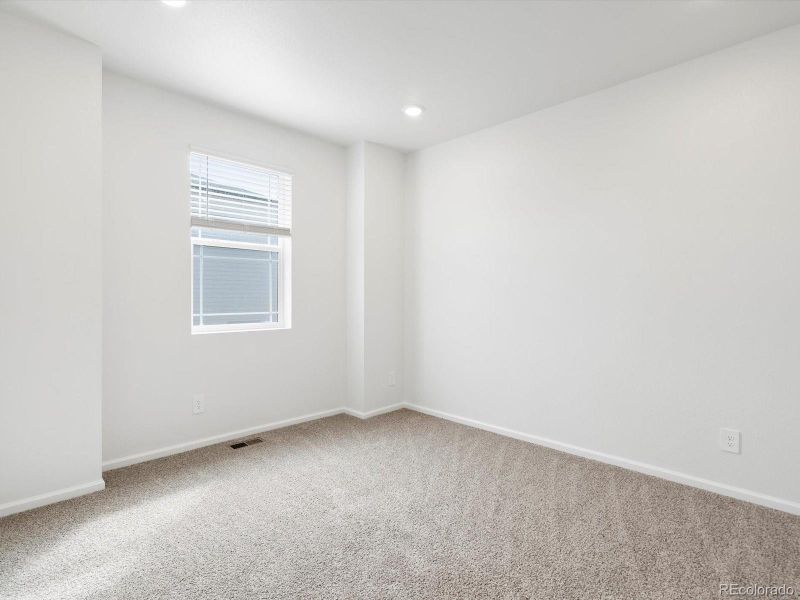 Spacious, unfurnished interior of a new home in Buffalo Highlands: The Canyon Collection, Commerce City (Image 20).