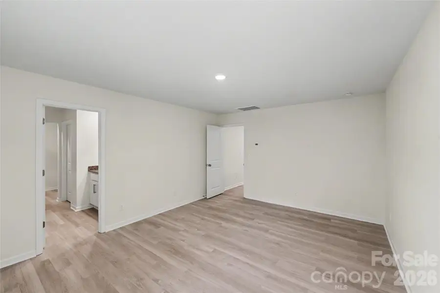 Spacious, unfurnished interior of a new home in , Iron Station (Image 11).