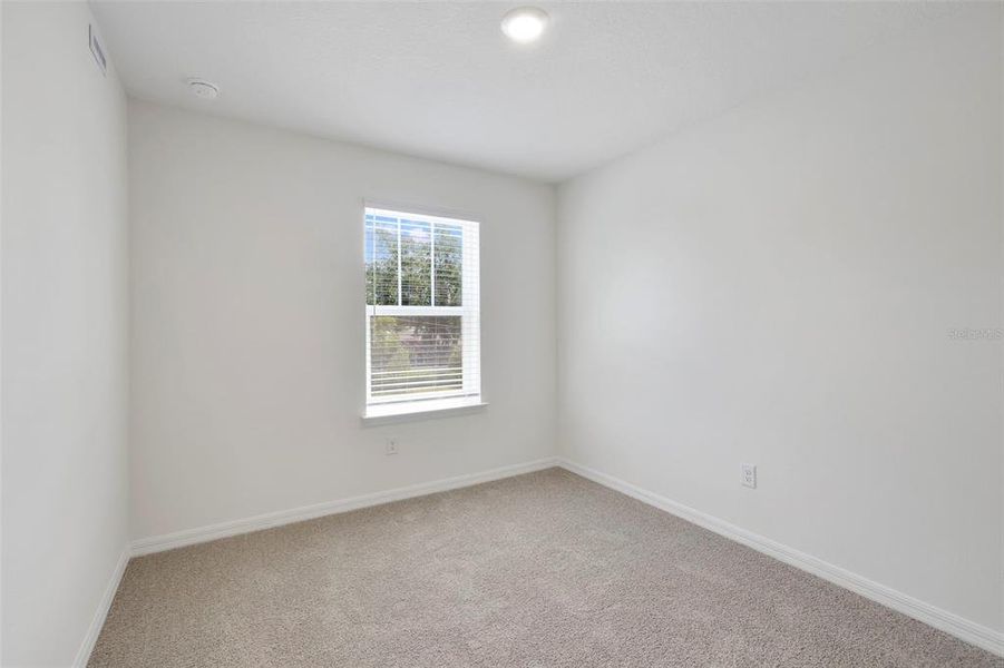 Spacious, unfurnished interior of a new home in Towns at Riverwalk, Sanford (Image 19).