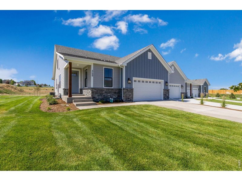 Front exterior of a new home in , Greeley, CO, highlighting curb appeal (Image 1). Front exterior of a new home in , Greeley, CO, highlighting curb appeal (Image 1).