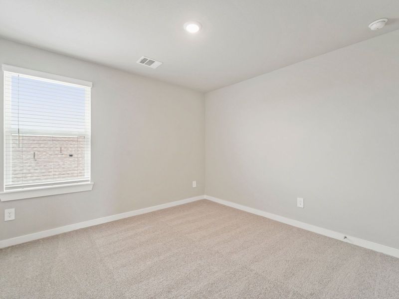 Spacious, unfurnished interior of a new home in Granger Pointe - Premier Series, Conroe (Image 18).