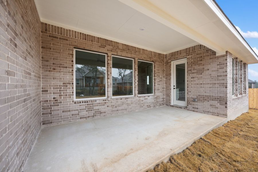 Representative exterior photo of a completed home built from the Carolina by Ashton Woods in The Estates at La Cima, San Marcos, TX (Image 24). Representative exterior photo of a completed home built from the Carolina by Ashton Woods in The Estates at La Cima, San Marcos, TX (Image 24).