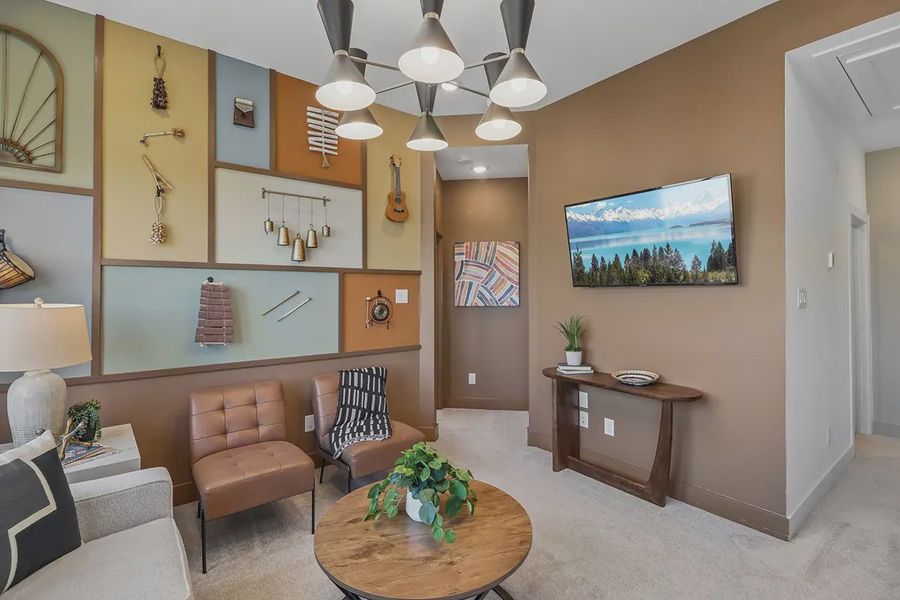 Furnished interior view inside a new home in Meridiana Chateau, Manvel (Image 21).