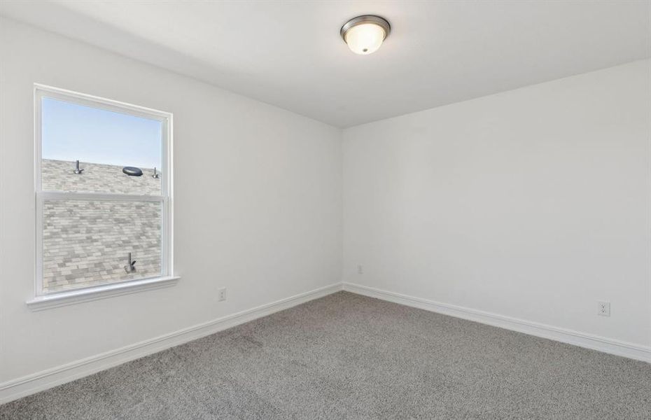 Secondary bedroom designed for comfort and convenience