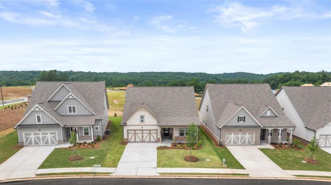 Front exterior of a new home in The Court at Gainesville Township, Gainesville, GA, highlighting curb appeal (Image 1).