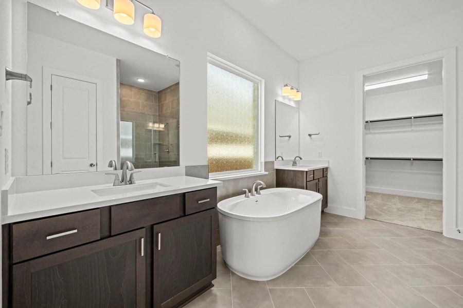 Primary Bath retreat with dual vanities & soaking tub
