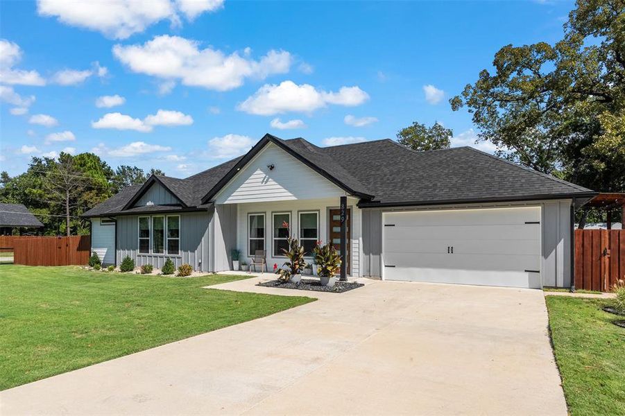 Front exterior of a new home in , Tool, TX, highlighting curb appeal (Image 2). Front exterior of a new home in , Tool, TX, highlighting curb appeal (Image 2).