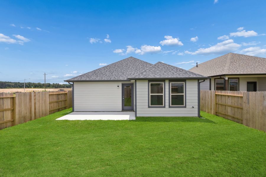Exterior details and patio area of a home in Riviera Pines, Huffman (Image 3).
