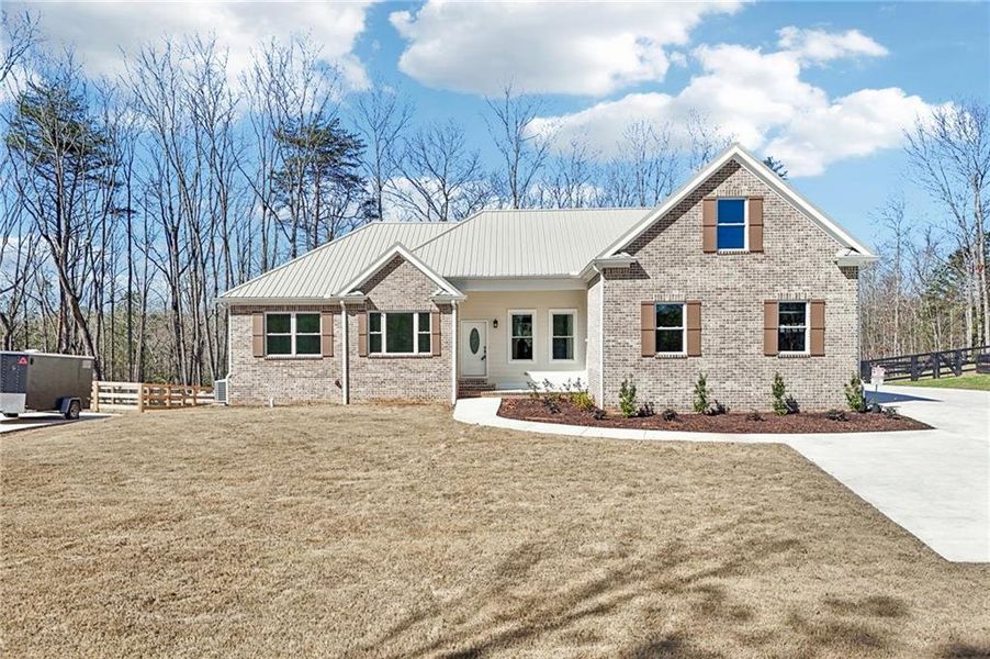 Front exterior of a new home in , Canton, GA, highlighting curb appeal (Image 30).