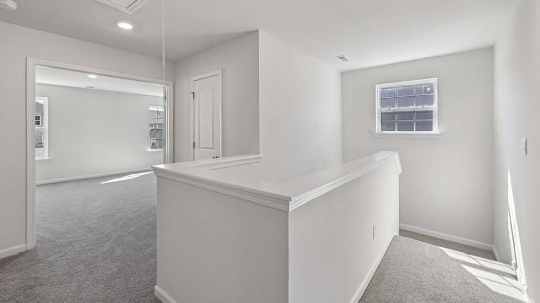 Furnished interior view inside a new home in The Falls at Newton, Newton (Image 7).