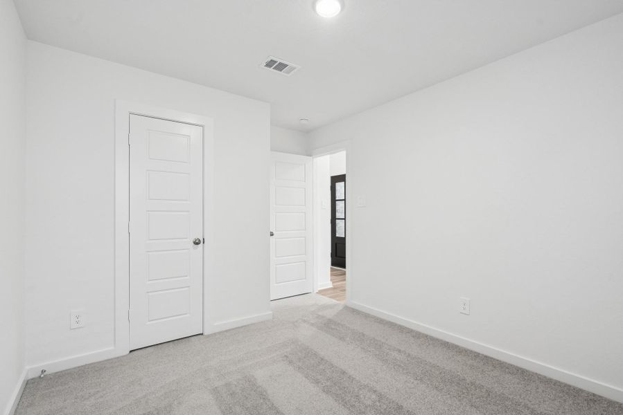 Spacious, unfurnished interior of a new home in Pinewood at Grand Texas, New Caney (Image 7).