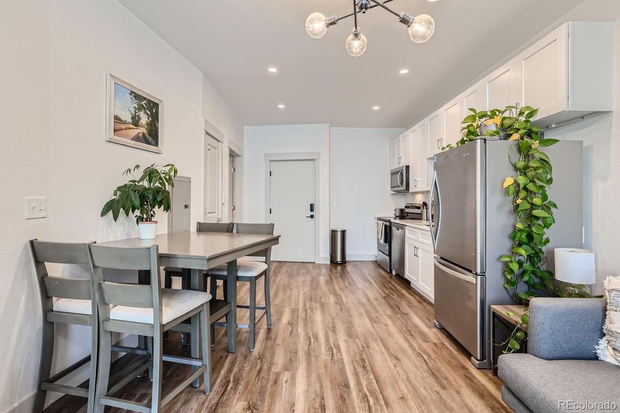 Beautiful vinyl floors connect the entire space