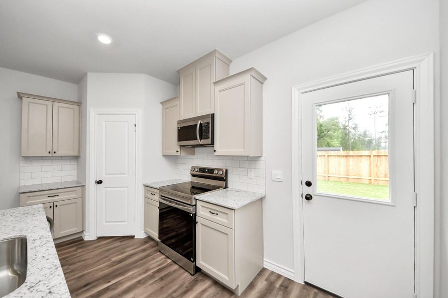 Furnished interior view inside a new home in The Enclave at Spring Branch, Montgomery (Image 14).