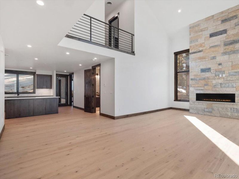 Open living area and kitchen Open living area and kitchen