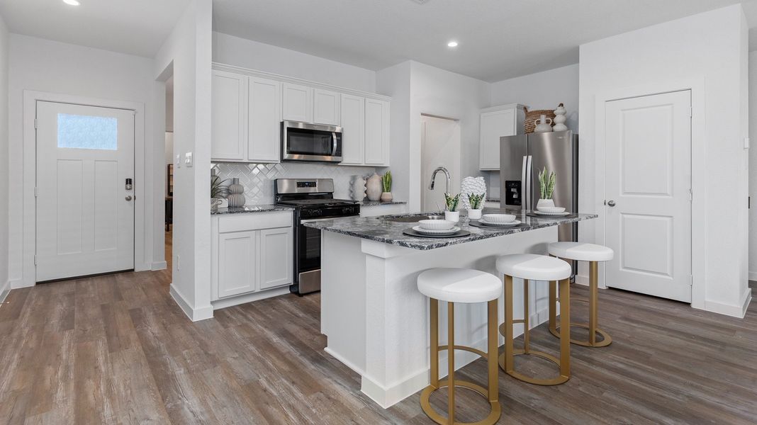 Representative furnished interior of a home built from the BOXWOOD by D.R. Horton in Legacy Village, Houston (Image 6).