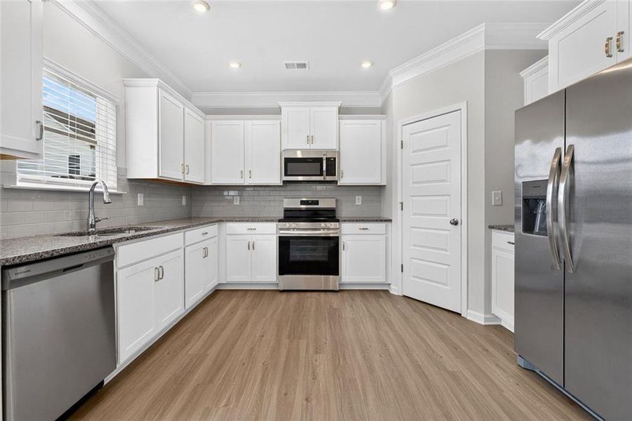 Furnished interior view inside a new home in Fuller Station, Loganville (Image 34).