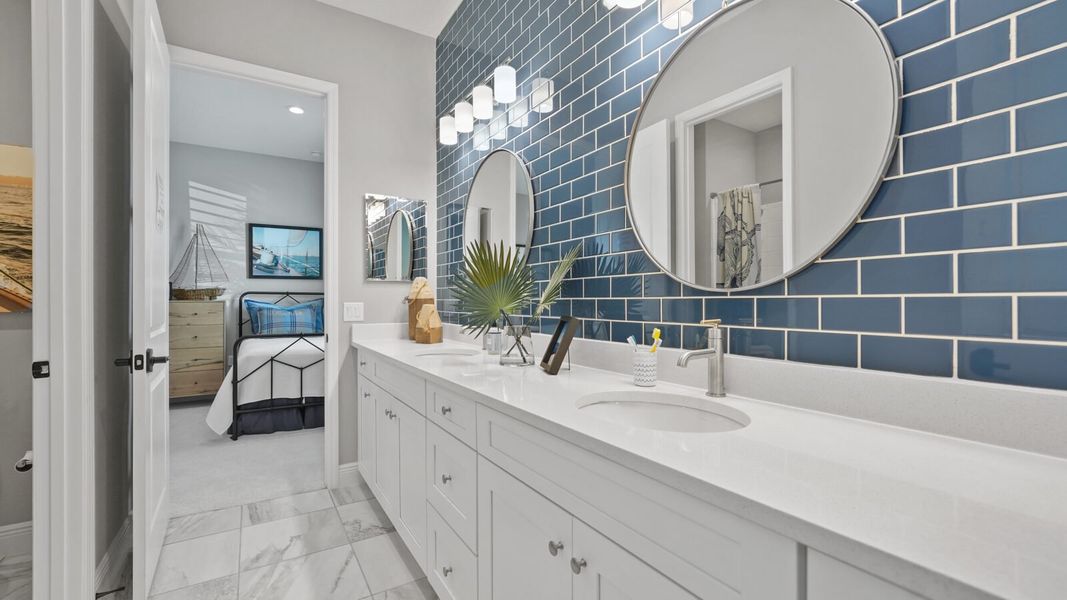 Representative furnished interior of a home built from the Sea Mist by Neal Communities in Vistera of Venice, Venice (Image 19).