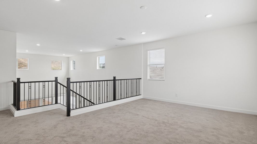 Representative unfurnished interior of a home built from the Phoenician by D.R. Horton in The Ridge at Stone Butte, Phoenix (Image 29).
