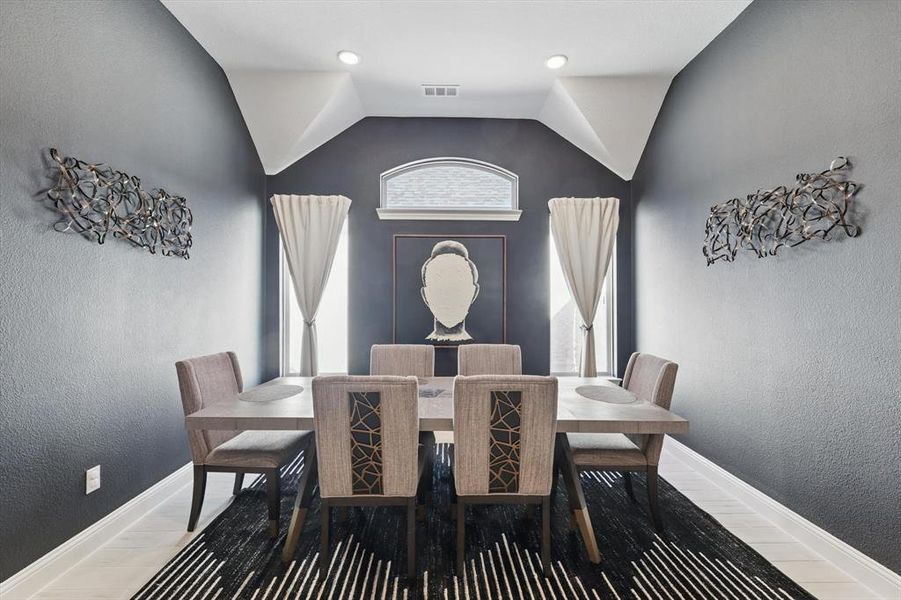 Tasteful & Chic are thoughts that come to mind when thinking of the Formal Dining Room.