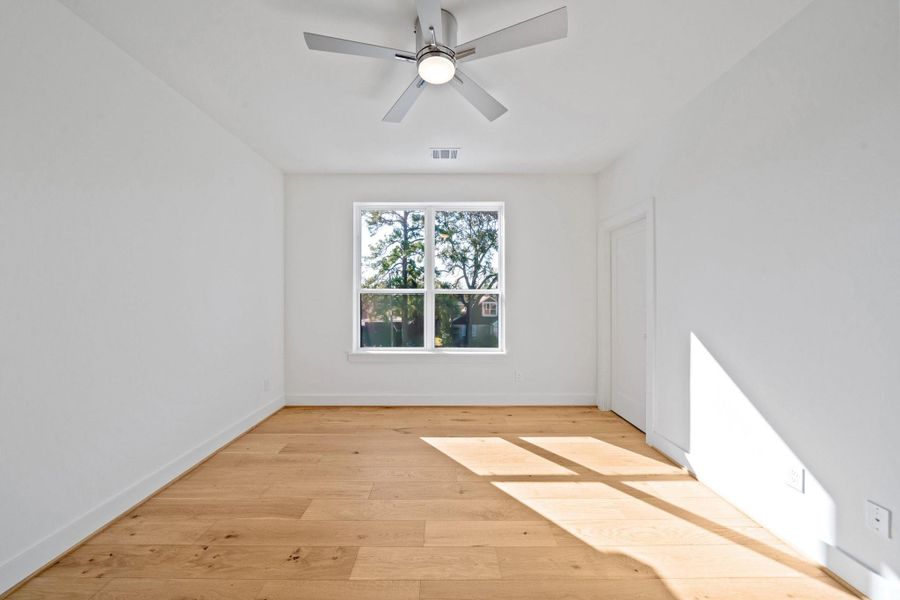 Upstairs secondary bedroom. Upstairs secondary bedroom.