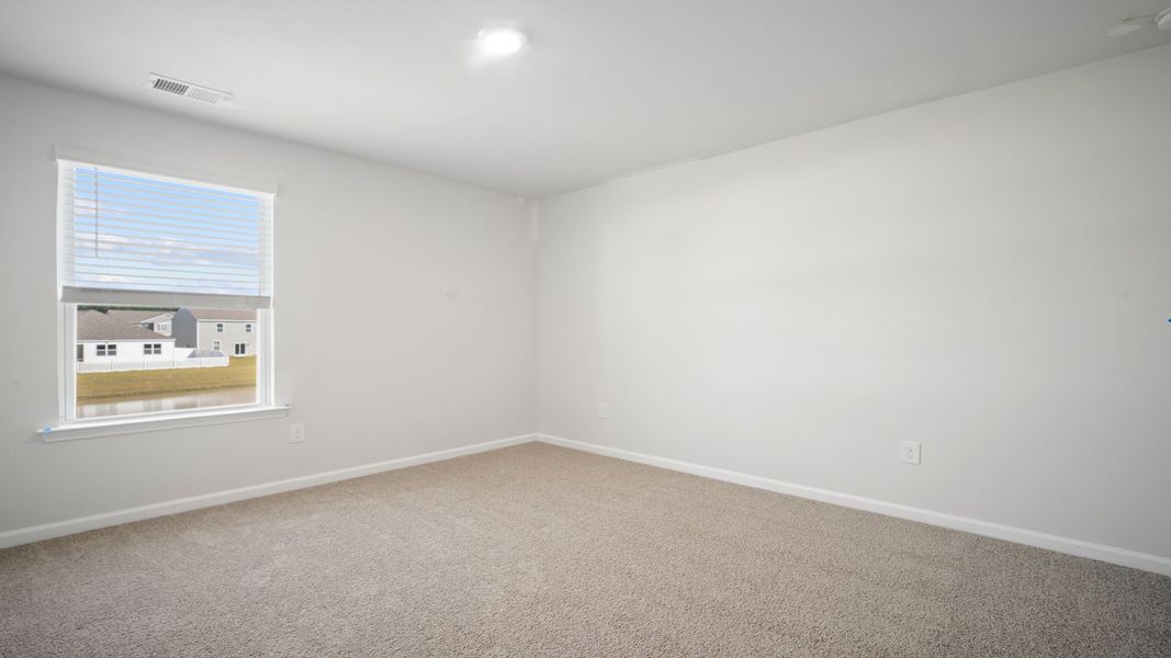 Spacious, unfurnished interior of a new home in The Retreat at East Argent, Ridgeland (Image 13).