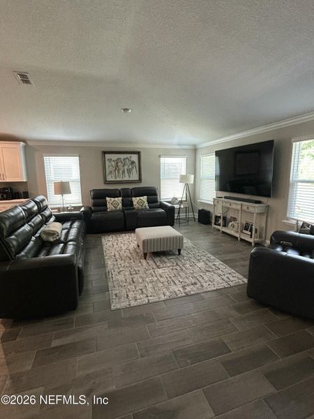 Furnished interior view inside a new home in Dorado at Entrada, St. Augustine (Image 11).