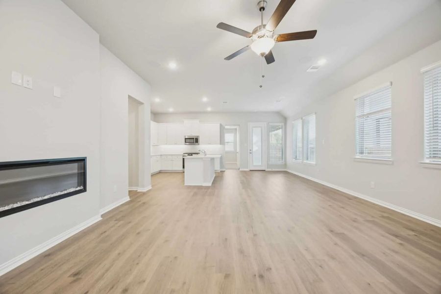Representative unfurnished interior of a home built from the Sacramento by Chesmar Homes in Summer Crest, Crowley (Image 9).