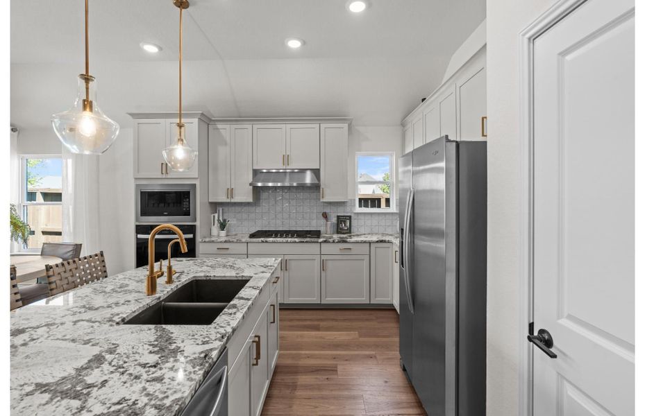 Furnished interior view inside a new home in Bison Ridge, San Antonio (Image 5).