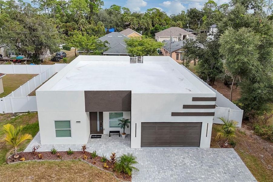 Front exterior of a new home in , Port Charlotte, FL, highlighting curb appeal (Image 21).