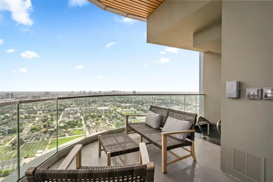 Enjoy dining on the outside balcony with heated private pool.