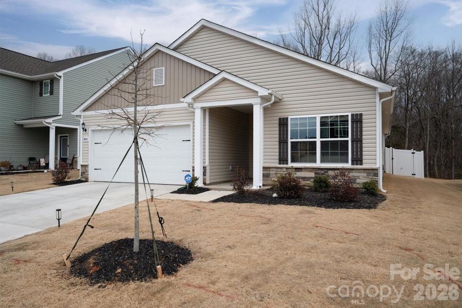 Front exterior of a new home in Stagecoach Station, Gastonia, NC, highlighting curb appeal (Image 21).