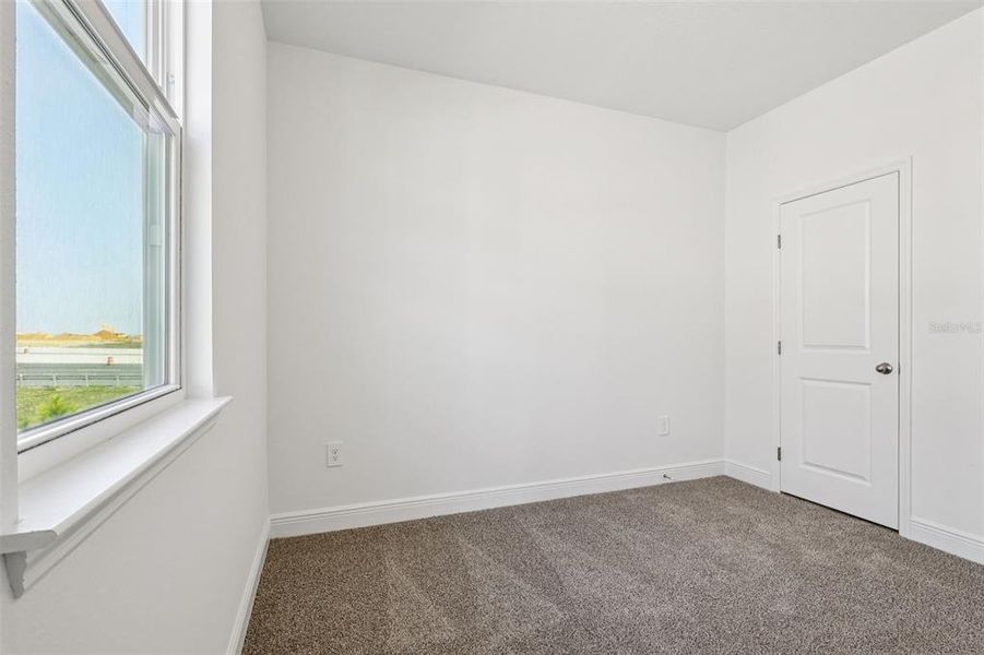 Spacious, unfurnished interior of a new home in Cyrene at Minneola - Villas, Minneola (Image 32).