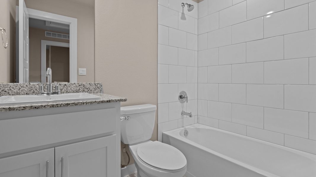 Representative furnished interior of a home built from the Shelby by D.R. Horton in Legacy South, Midland (Image 8).