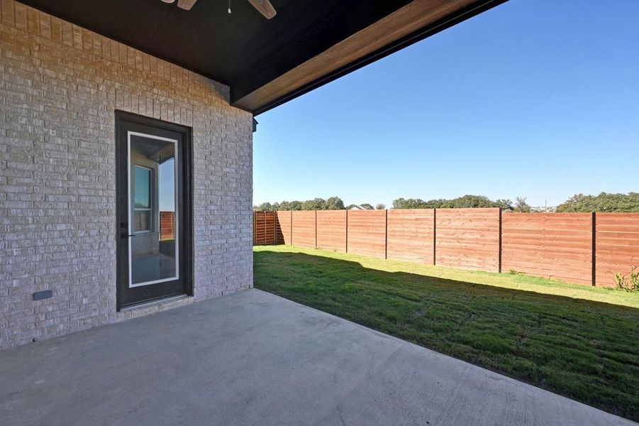 Exterior details and patio area of a home in Broken Oak, Georgetown (Image 22).