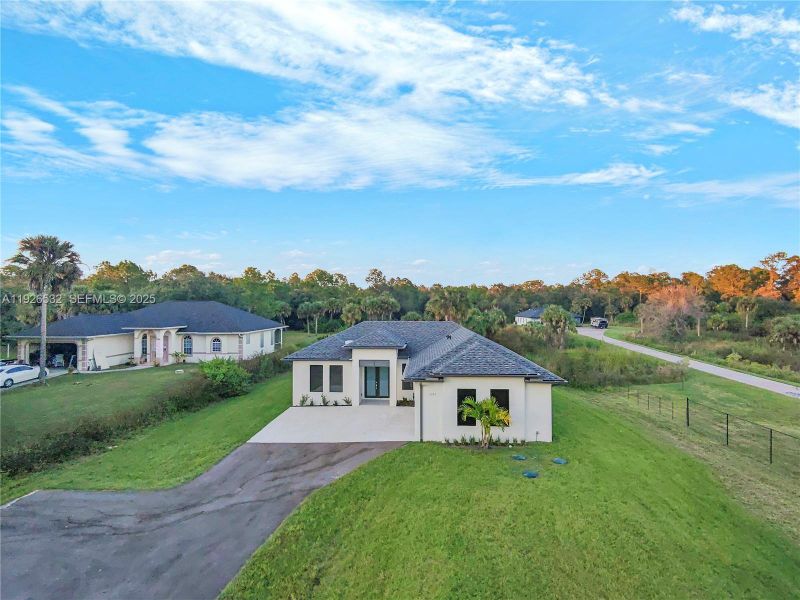 Exterior details and patio area of a home in , Naples (Image 32). Exterior details and patio area of a home in , Naples (Image 32).