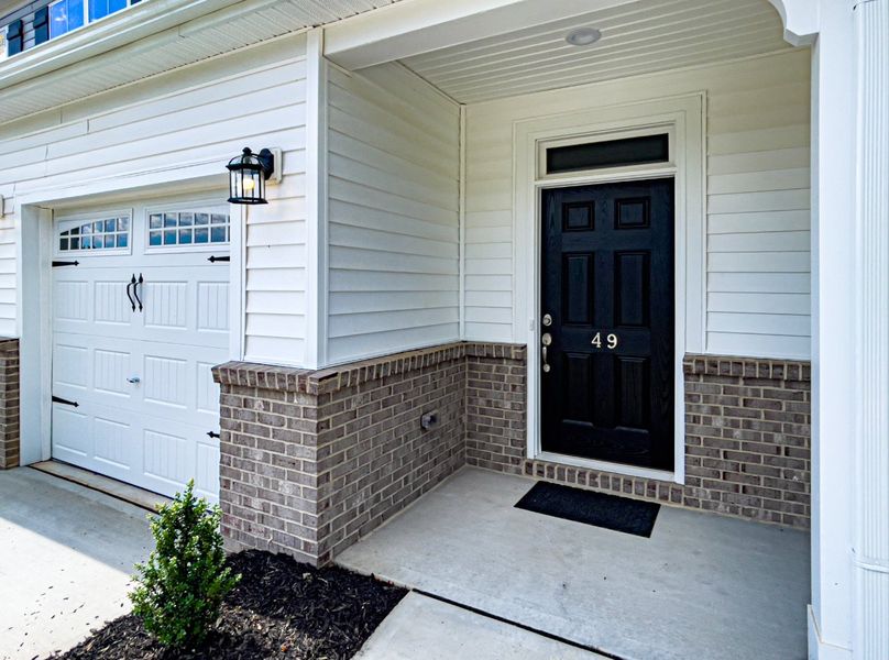 Front exterior of a new home in Fairview Village Townhomes, Simpsonville, SC, highlighting curb appeal (Image 17). Front exterior of a new home in Fairview Village Townhomes, Simpsonville, SC, highlighting curb appeal (Image 17).