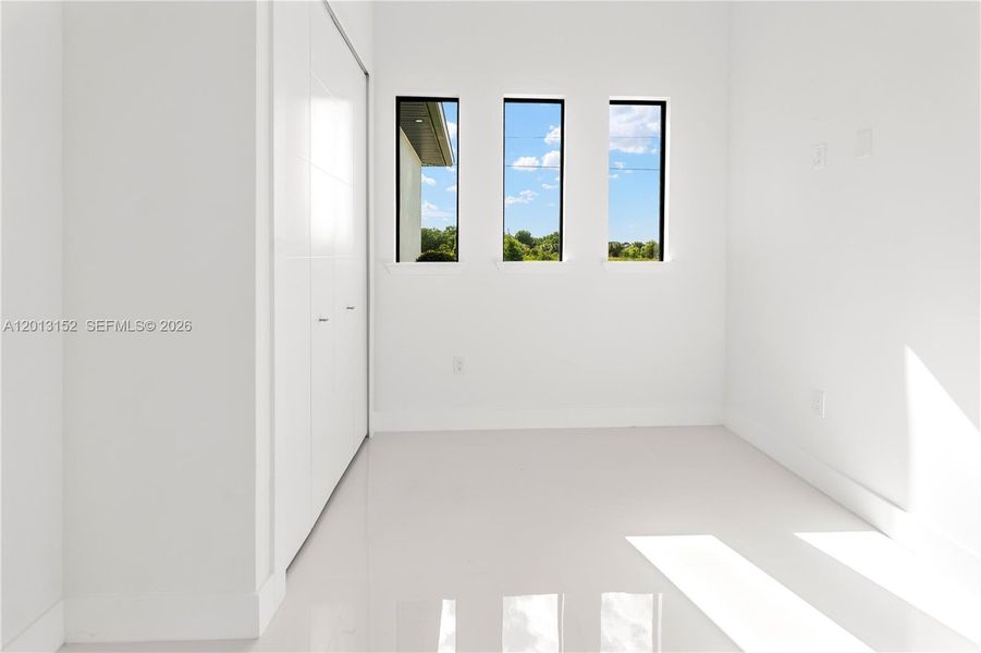 Spacious, unfurnished interior of a new home in , Lehigh Acres (Image 43).