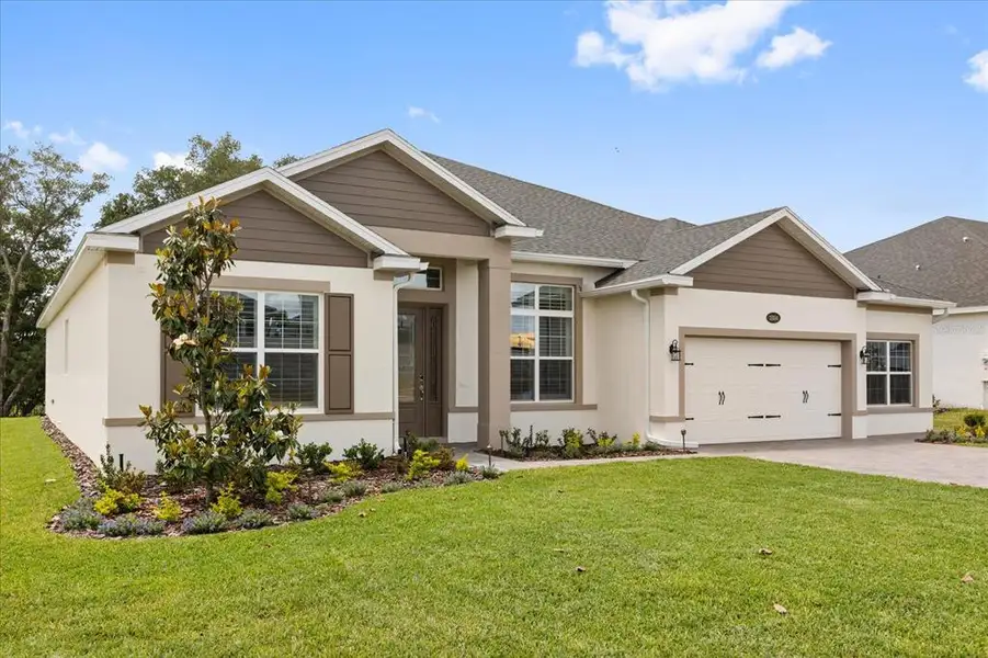 Front exterior of a new home in , Apopka, FL, highlighting curb appeal (Image 2).