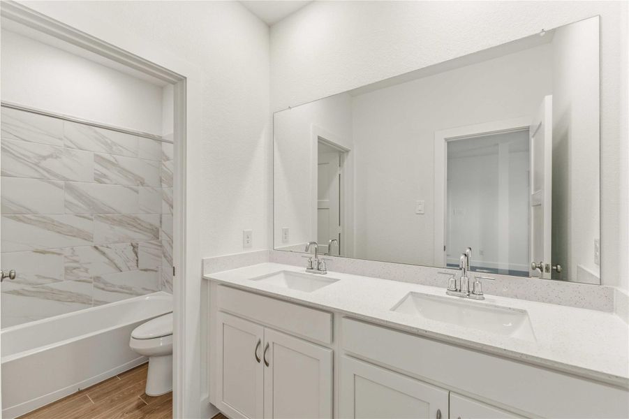 Furnished interior view inside a new home in Sunterra, Katy (Image 8). Furnished interior view inside a new home in Sunterra, Katy (Image 8).