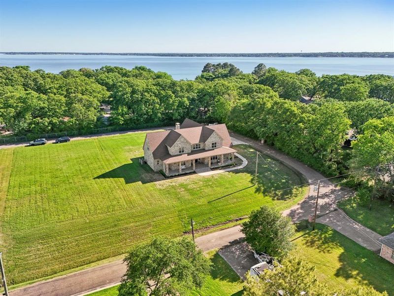 Front exterior of a new home in , Gun Barrel City, TX, highlighting curb appeal (Image 1). Front exterior of a new home in , Gun Barrel City, TX, highlighting curb appeal (Image 1).