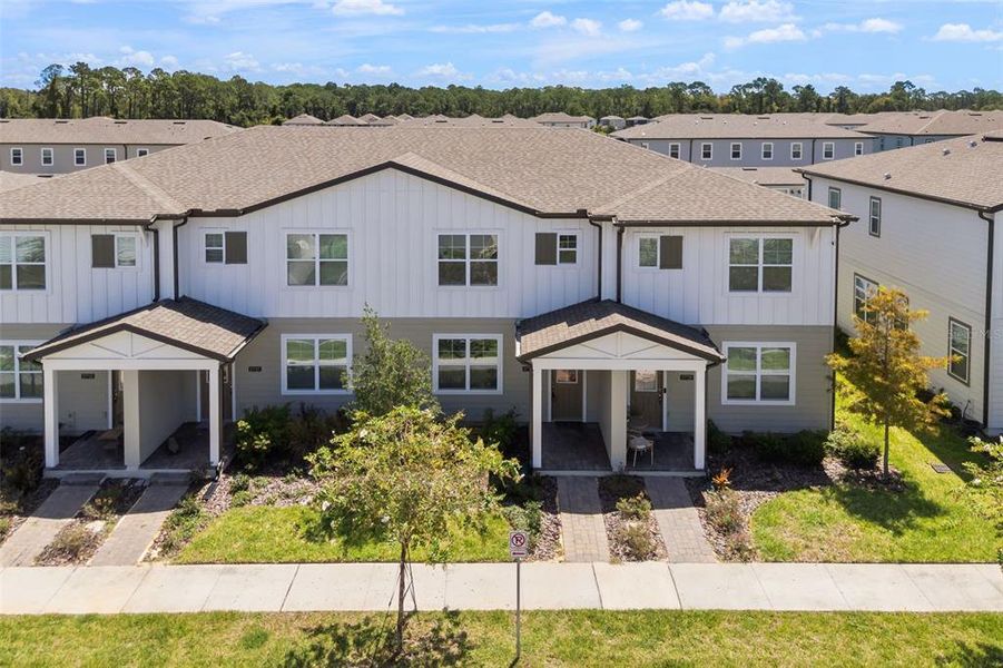 Front exterior of a new home in , Winter Garden, FL, highlighting curb appeal (Image 28). Front exterior of a new home in , Winter Garden, FL, highlighting curb appeal (Image 28).