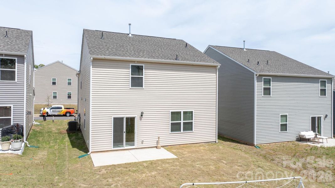 Exterior details and patio area of a home in The Hamptons at Hickory, Hickory (Image 4).