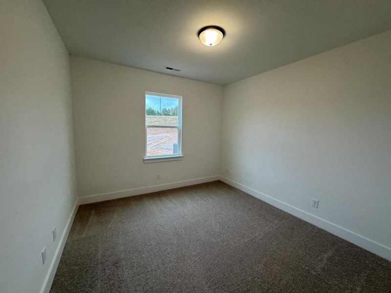 Spacious, unfurnished interior of a new home in Carrington, Stanley (Image 20).