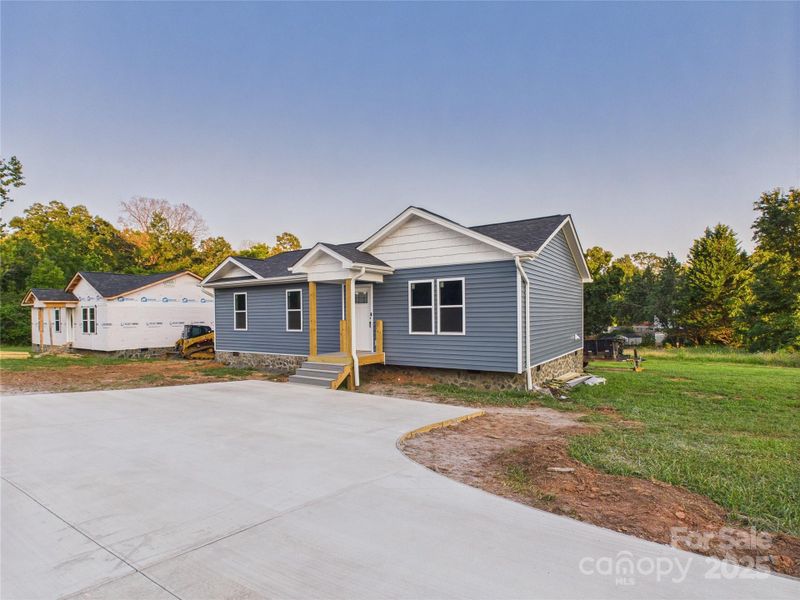 Front exterior of a new home in , Hudson, NC, highlighting curb appeal (Image 6). Front exterior of a new home in , Hudson, NC, highlighting curb appeal (Image 6).