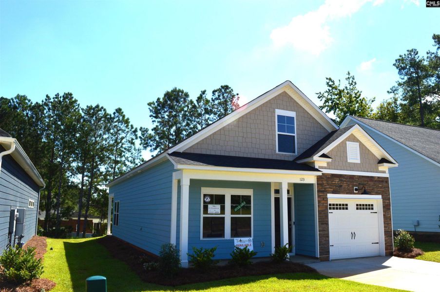 Front exterior of a new home in Bickley Station, Irmo, SC, highlighting curb appeal (Image 2).