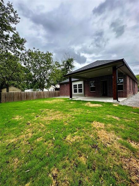 View of yard with a patio area